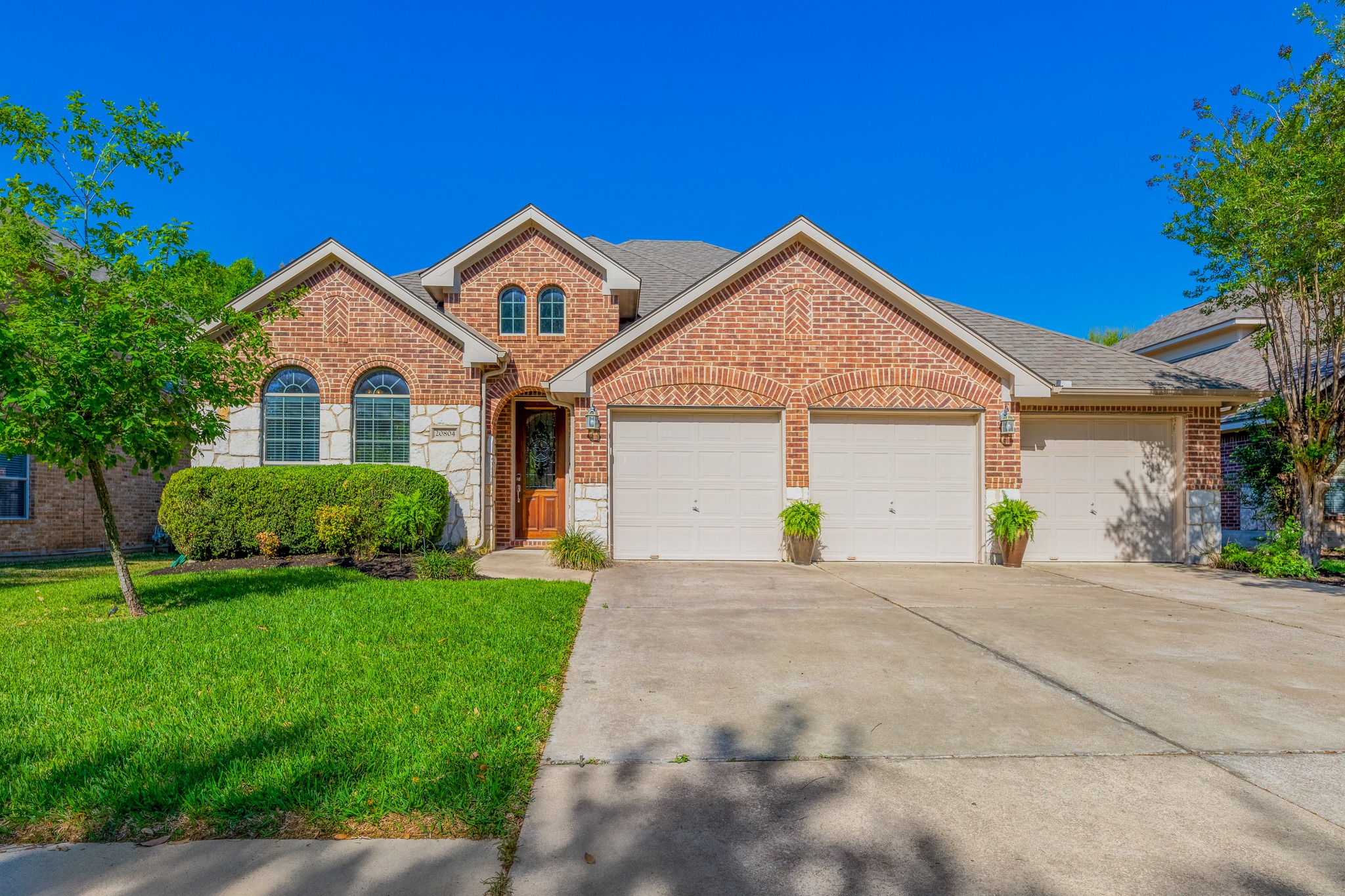 20804 Windmill Ridge Street Pflugerville, TX 78660 - Photo 1 of 40 Move-in-ready suburban living in Pflugerville’s amenity rich Commons at Rowe Lane!