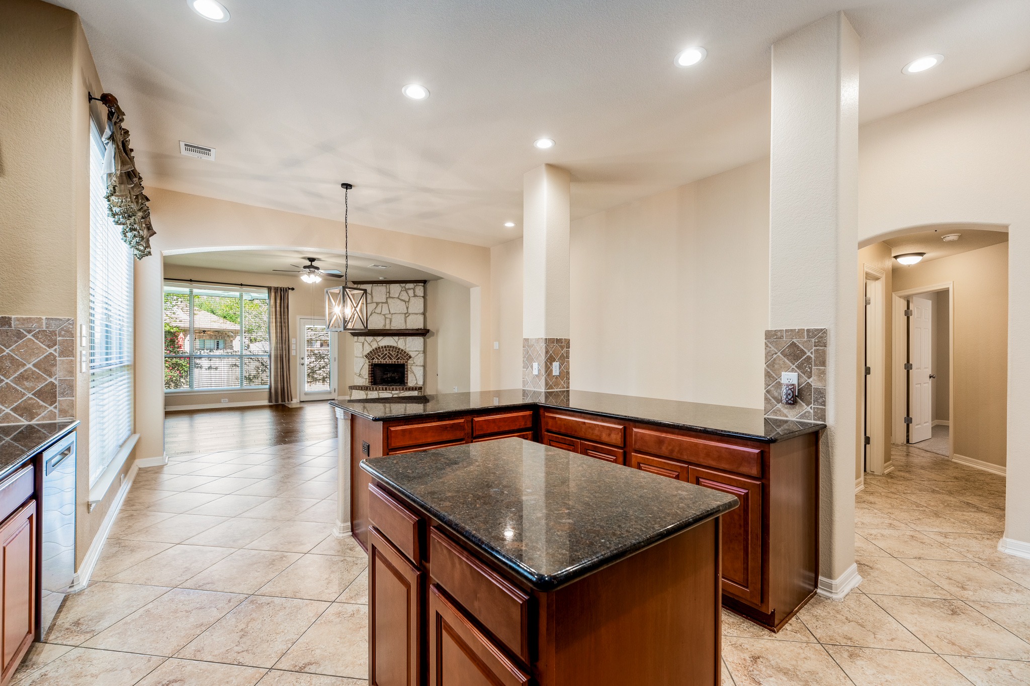 20804 Windmill Ridge Street Pflugerville, TX 78660 - Photo 40 of 40 The open floor plan makes it easy to stay connected while also maintaining a desirable separation of spaces.