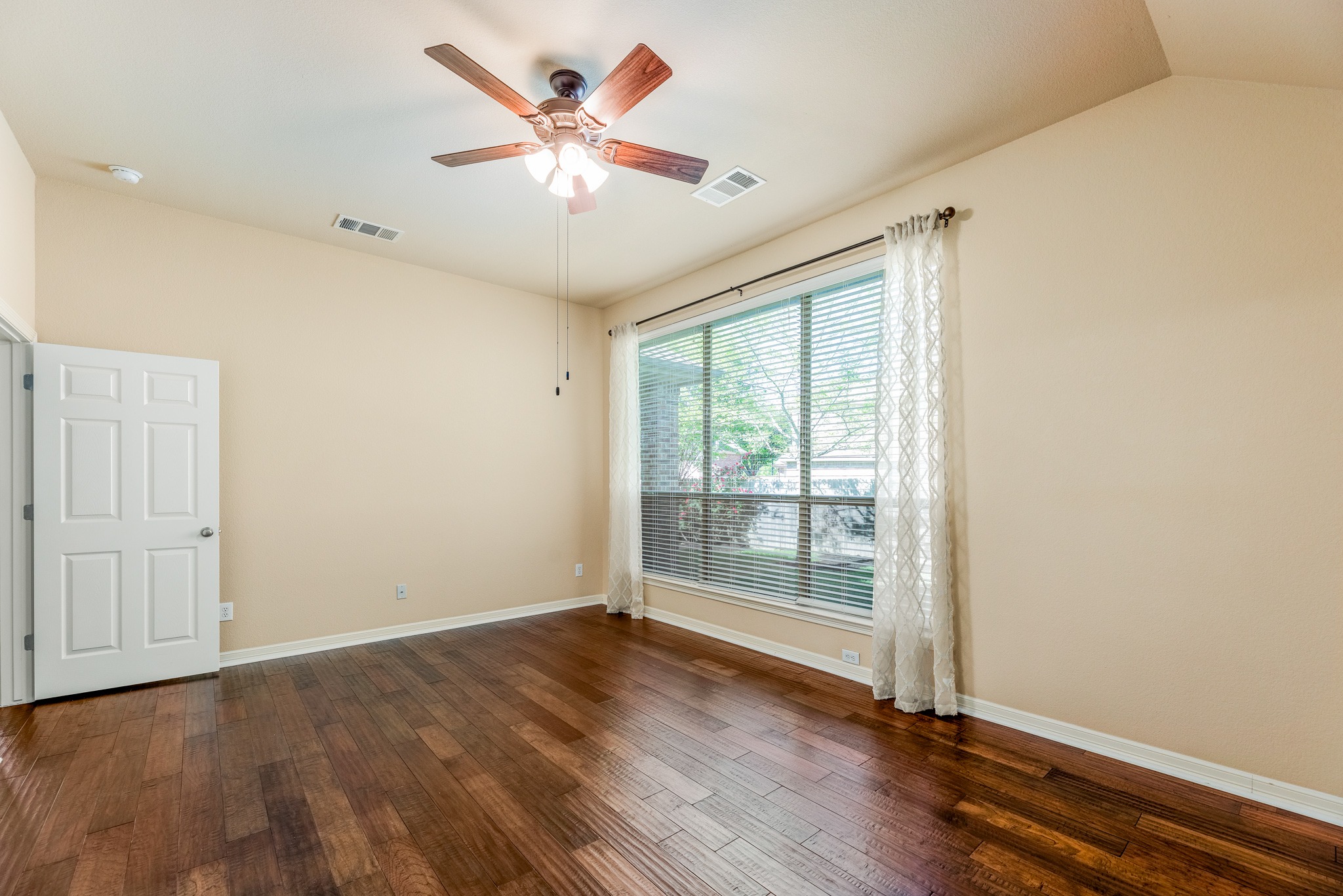 20804 Windmill Ridge Street Pflugerville, TX 78660 - Photo 18 of 40 The primary suite is peacefully secluded away at the back of the home for privacy.