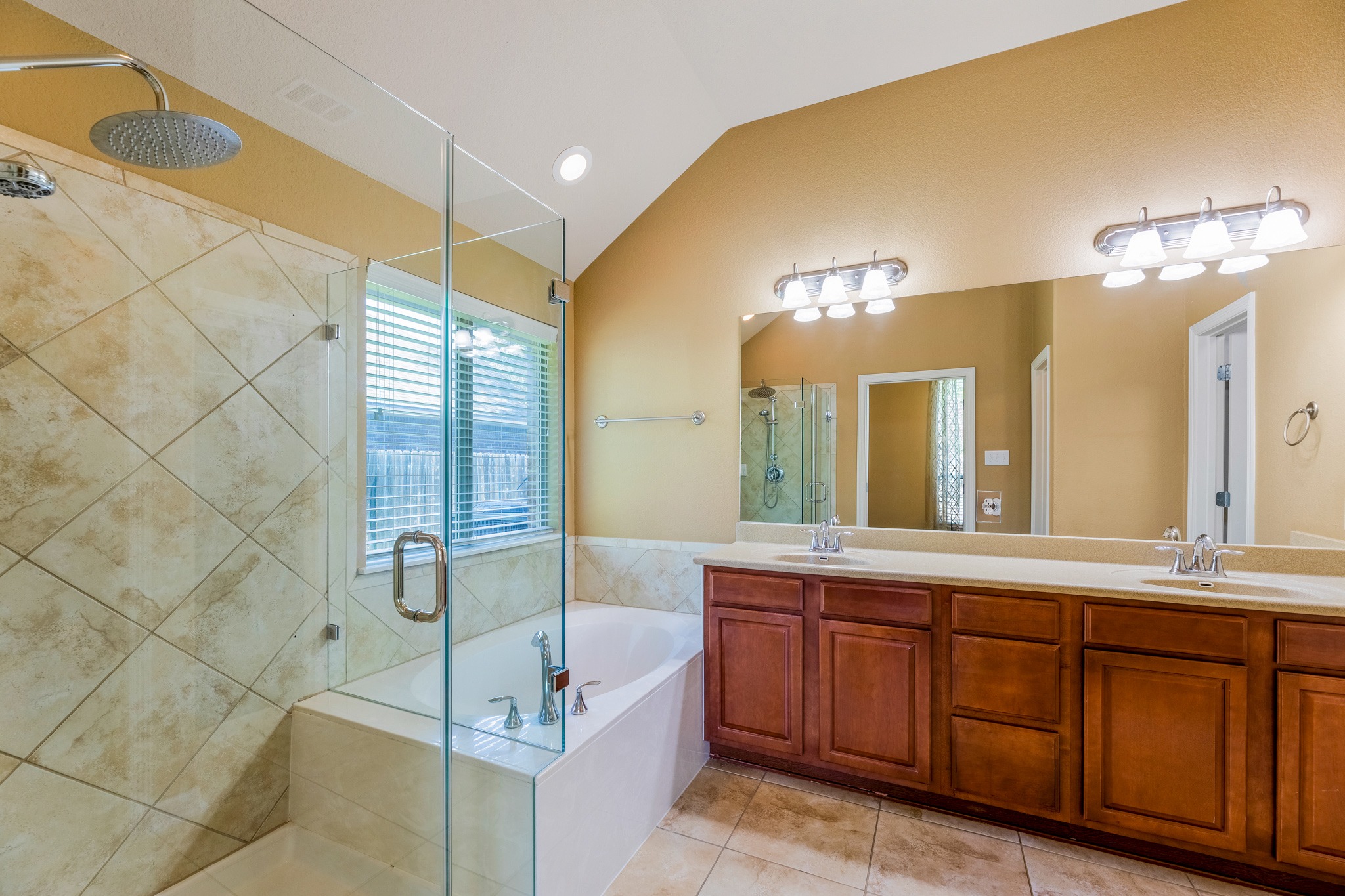 20804 Windmill Ridge Street Pflugerville, TX 78660 - Photo 21 of 40 The spacious dual vanity comes with beautifully staines cabinetry.