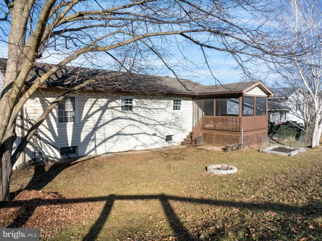 a view of entryway with wooden floor and door