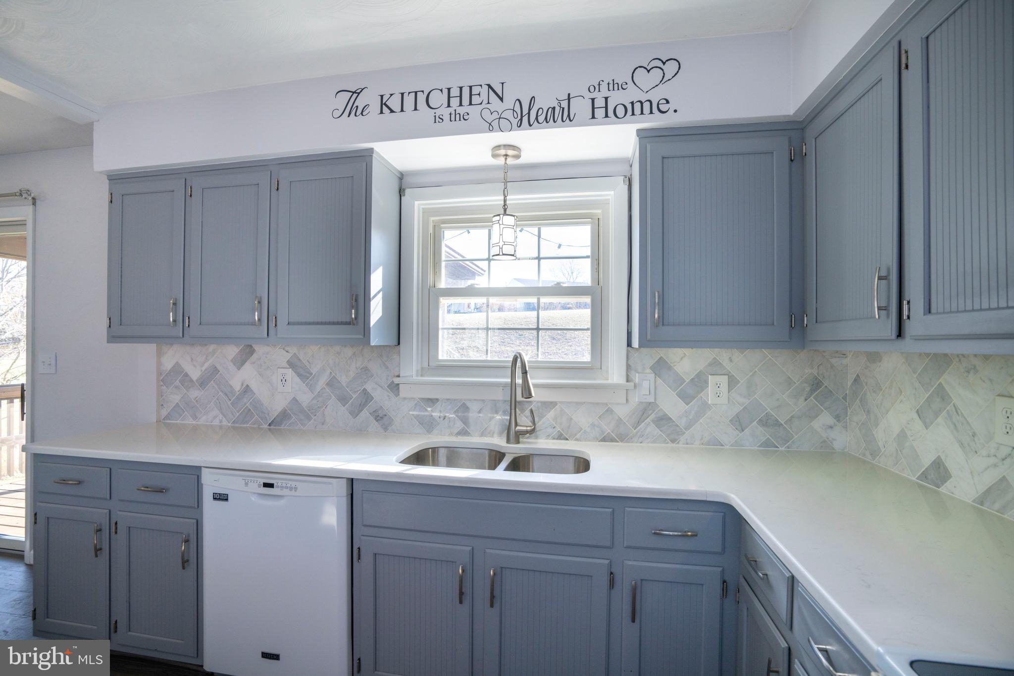 2510 Buchenhorst Road State College, PA 16801 - Photo 32 of 64 a kitchen with sink cabinets and window