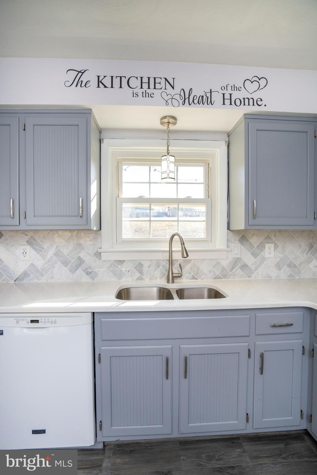 2510 Buchenhorst Road State College, PA 16801 - Photo 33 of 64 a kitchen with white cabinets and sink