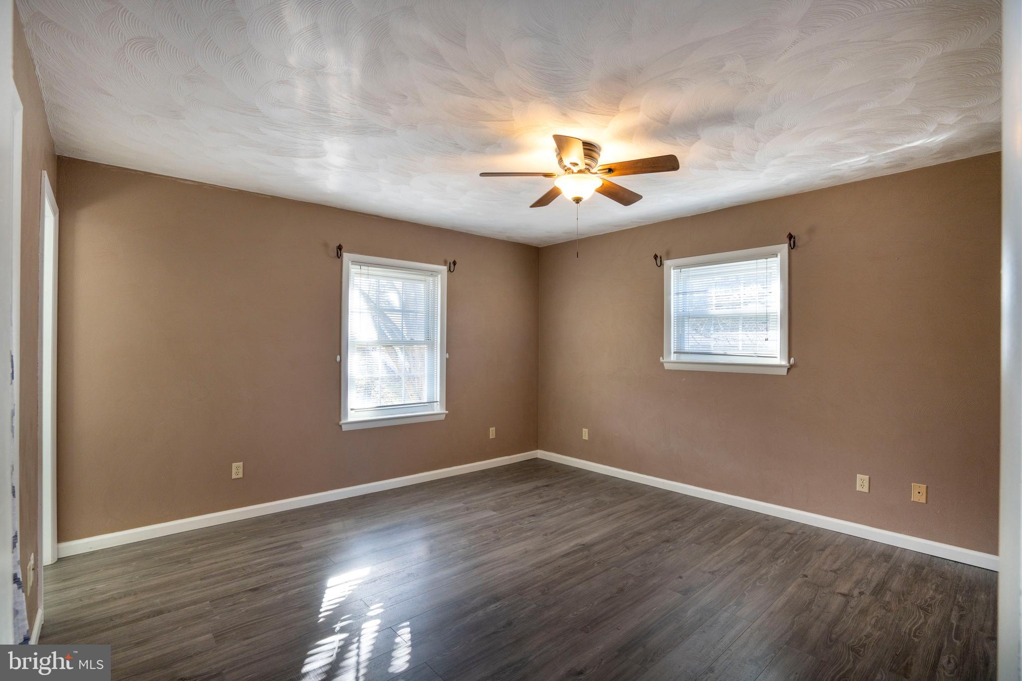 2510 Buchenhorst Road State College, PA 16801 - Photo 39 of 64 a view of an empty room with a window and wooden floor