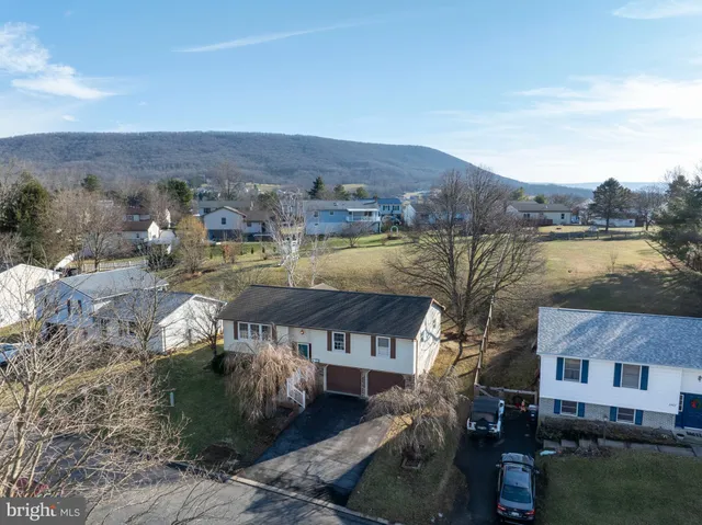 a view of a house with a lake view