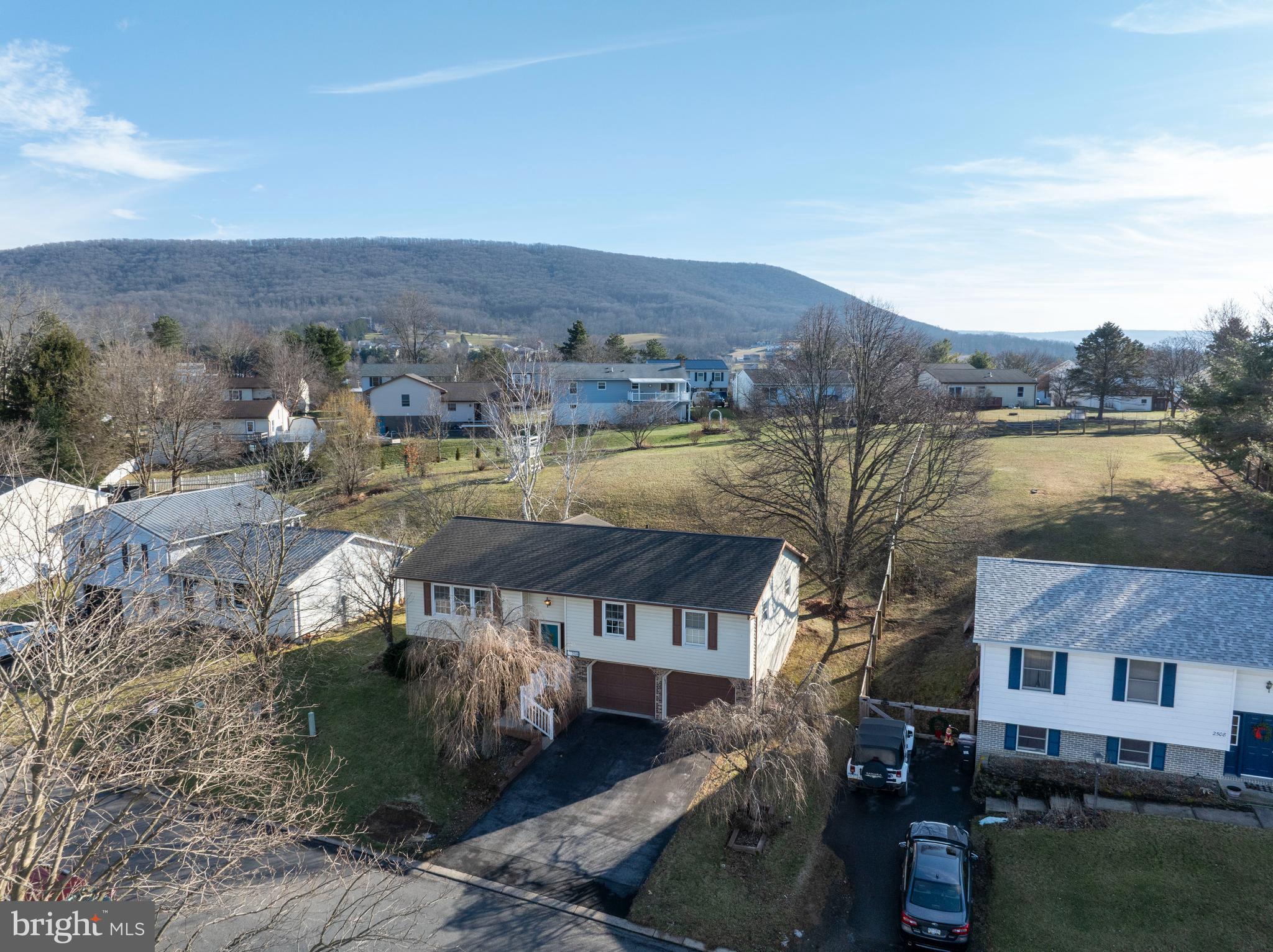 2510 Buchenhorst Road State College, PA 16801 - Photo 4 of 64 a view of a house with a lake view