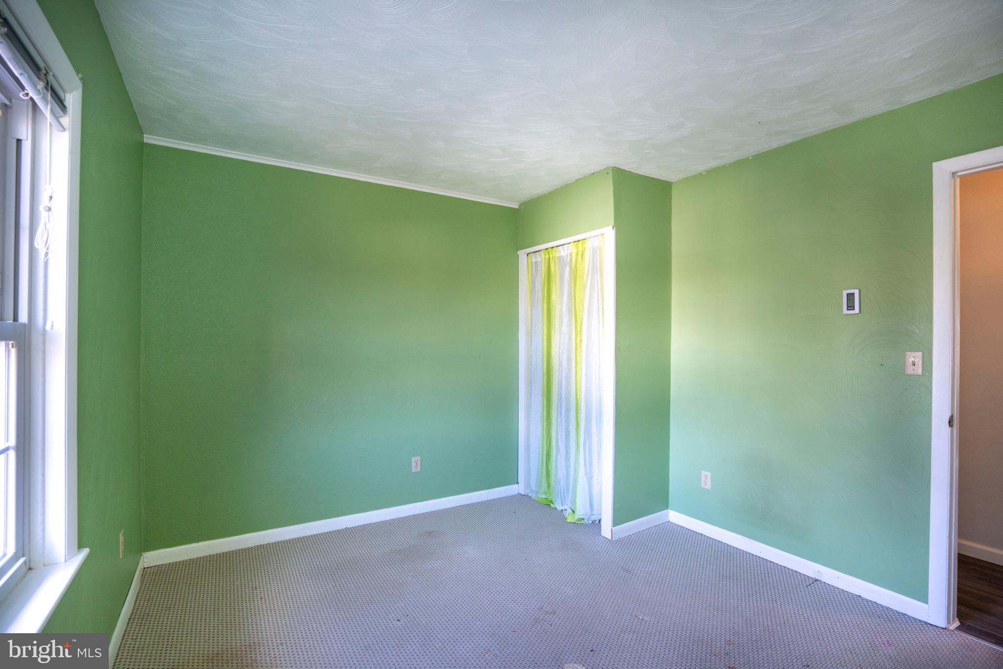 2510 Buchenhorst Road State College, PA 16801 - Photo 48 of 64 a view of an empty room with window and stairs
