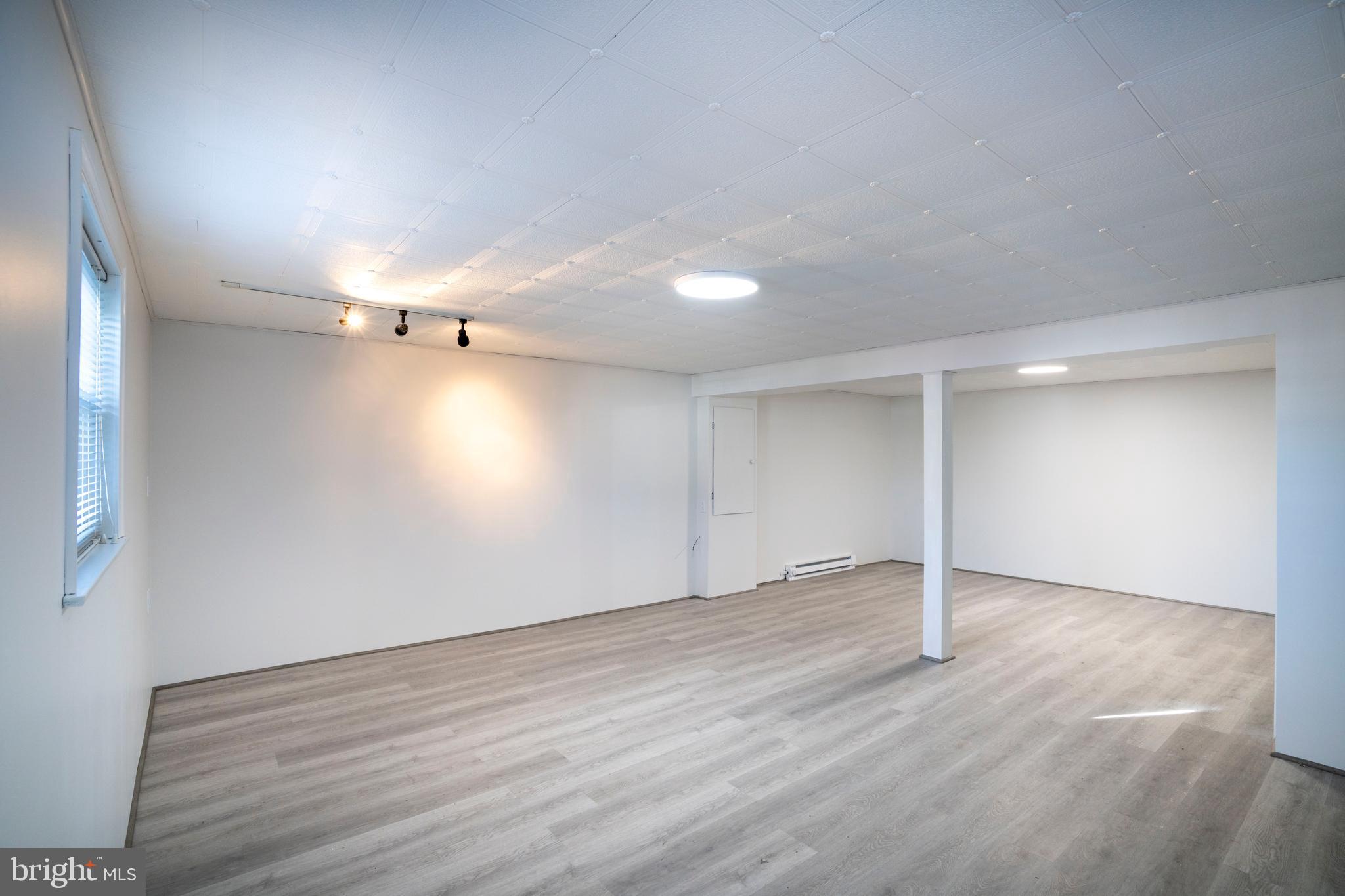 2510 Buchenhorst Road State College, PA 16801 - Photo 53 of 64 an empty room with wooden floor and windows
