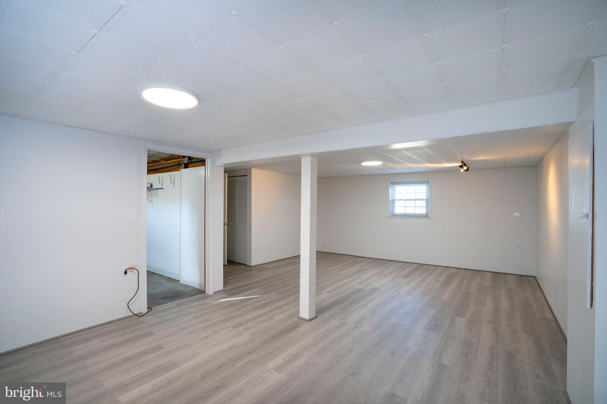 2510 Buchenhorst Road State College, PA 16801 - Photo 55 of 64 an empty room with wooden floor and windows