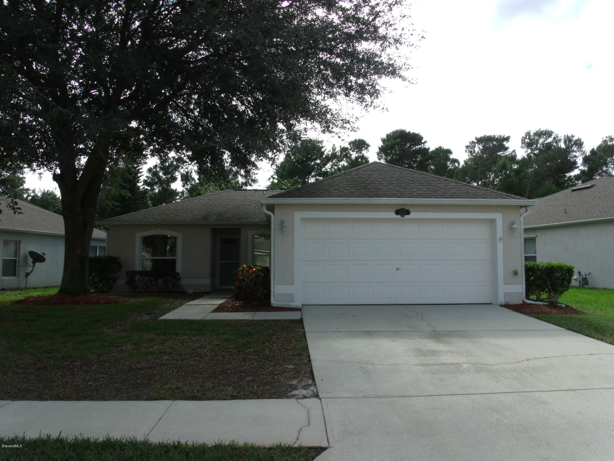 2126 Spring Creek Circle Palm Bay, FL 32905 - Photo 1 of 23 1-front view