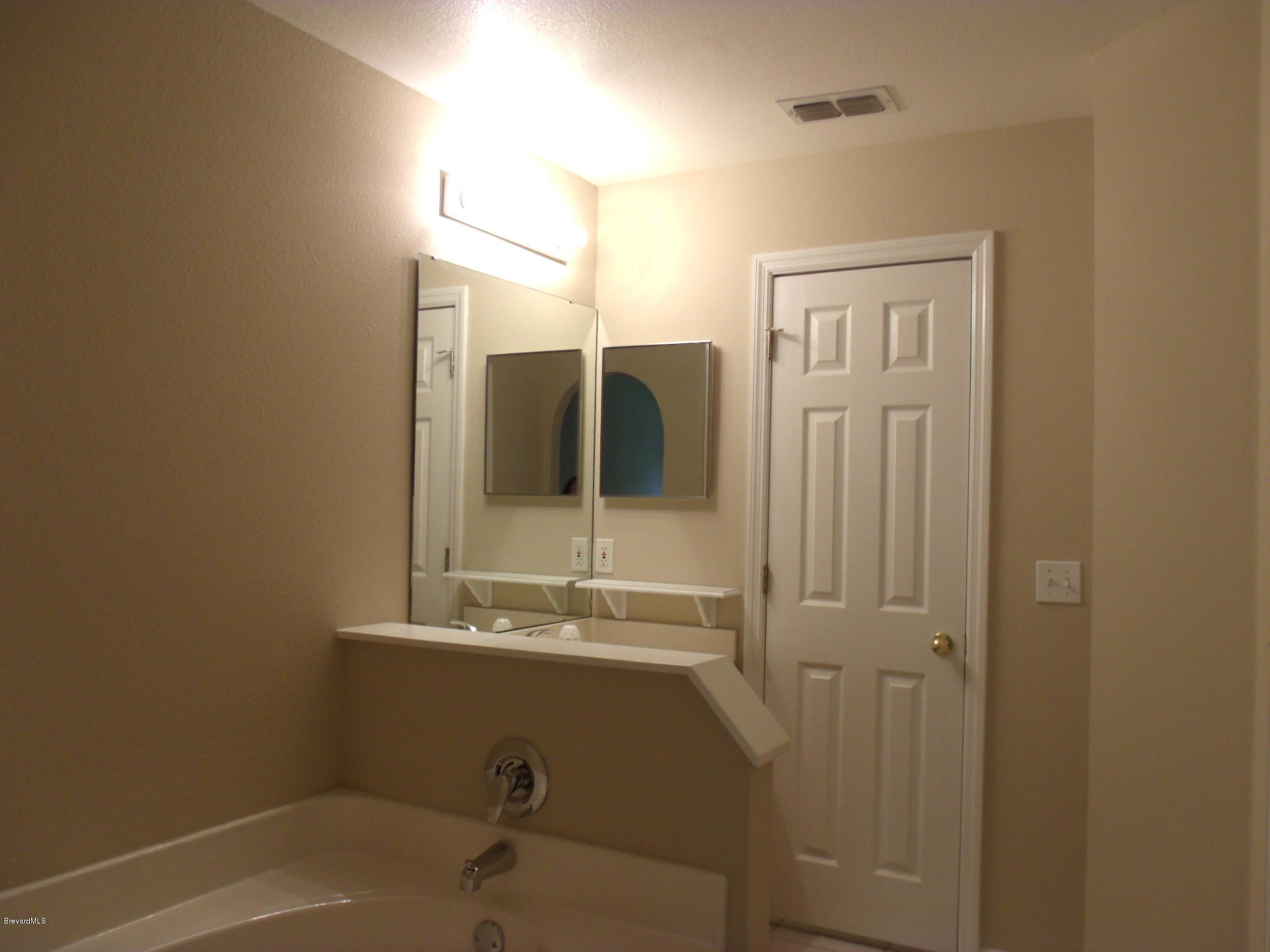 2126 Spring Creek Circle Palm Bay, FL 32905 - Photo 8 of 23 8-master bathroom