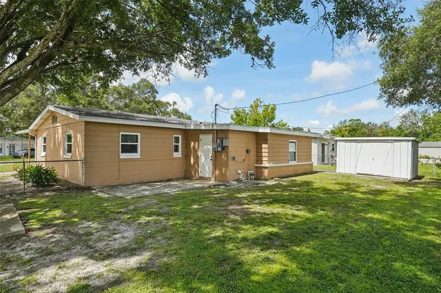 a view of a backyard with a garden