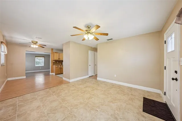 a view of an empty room with a window
