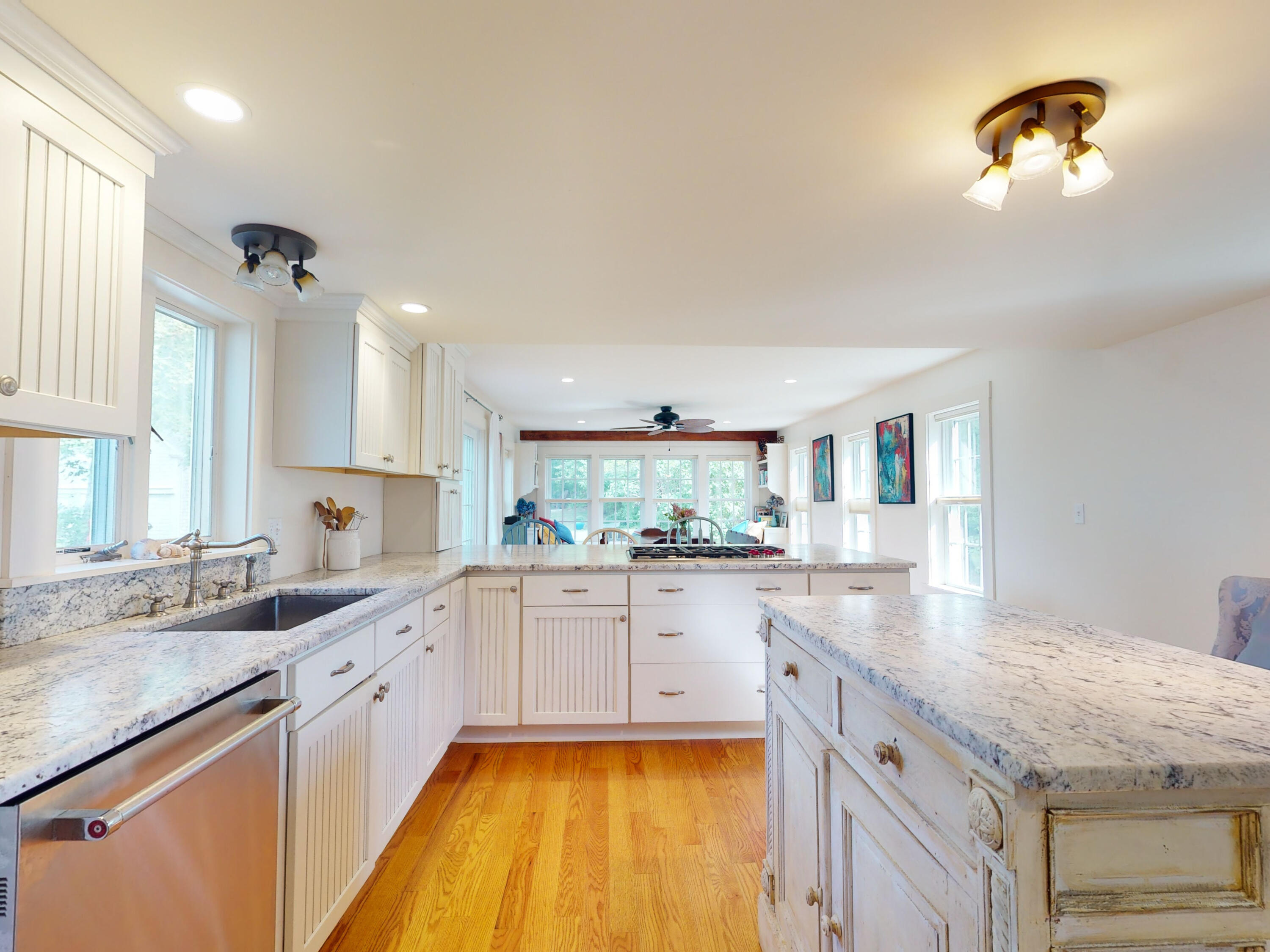 280 Chatham Road Harwich, MA 02645 - Photo 13 of 45 a kitchen with granite countertop a sink cabinets and window