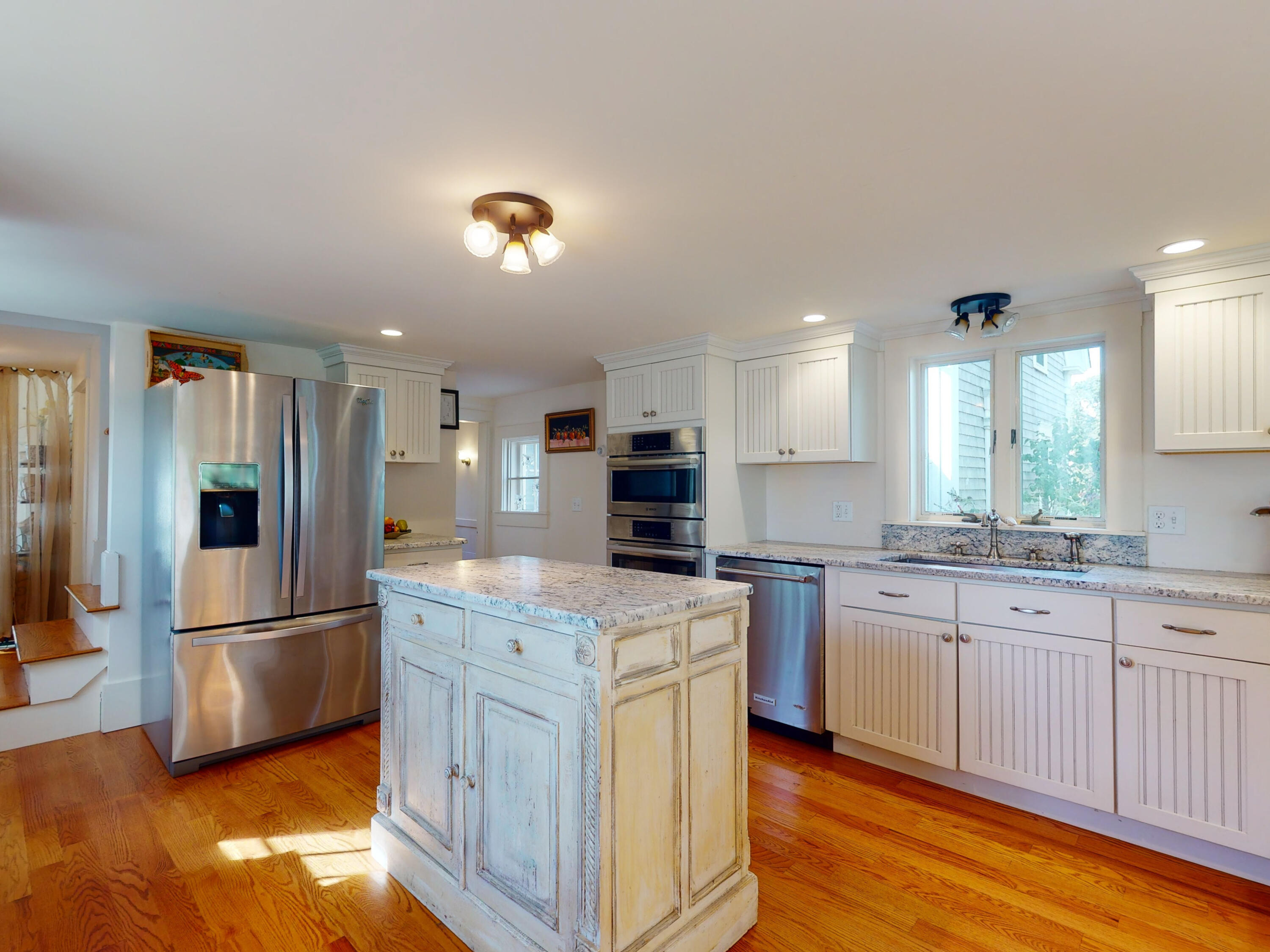 280 Chatham Road Harwich, MA 02645 - Photo 14 of 45 a kitchen with granite countertop a refrigerator stove top oven and sink