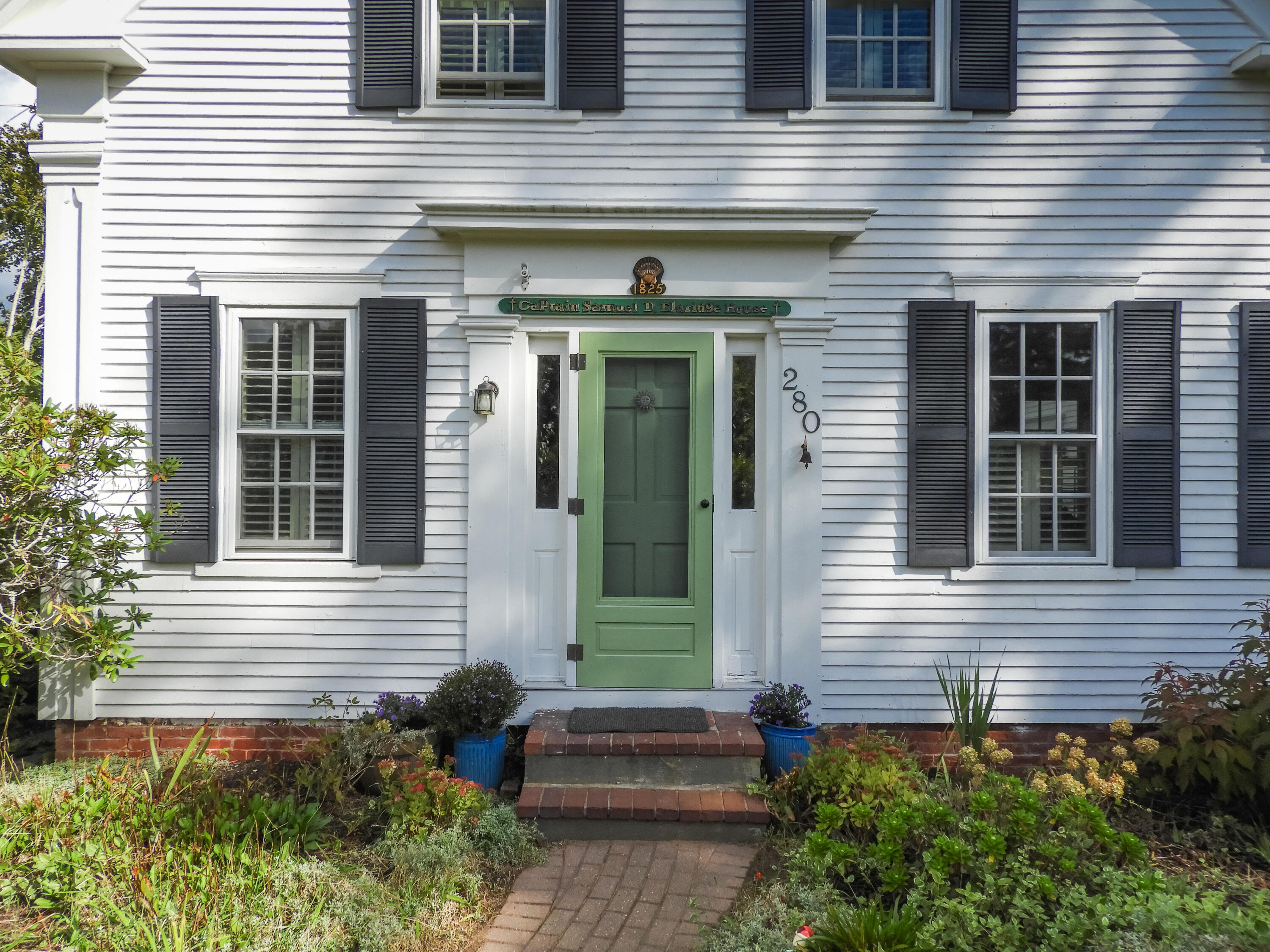 280 Chatham Road Harwich, MA 02645 - Photo 2 of 45 a front view of a house with a yard