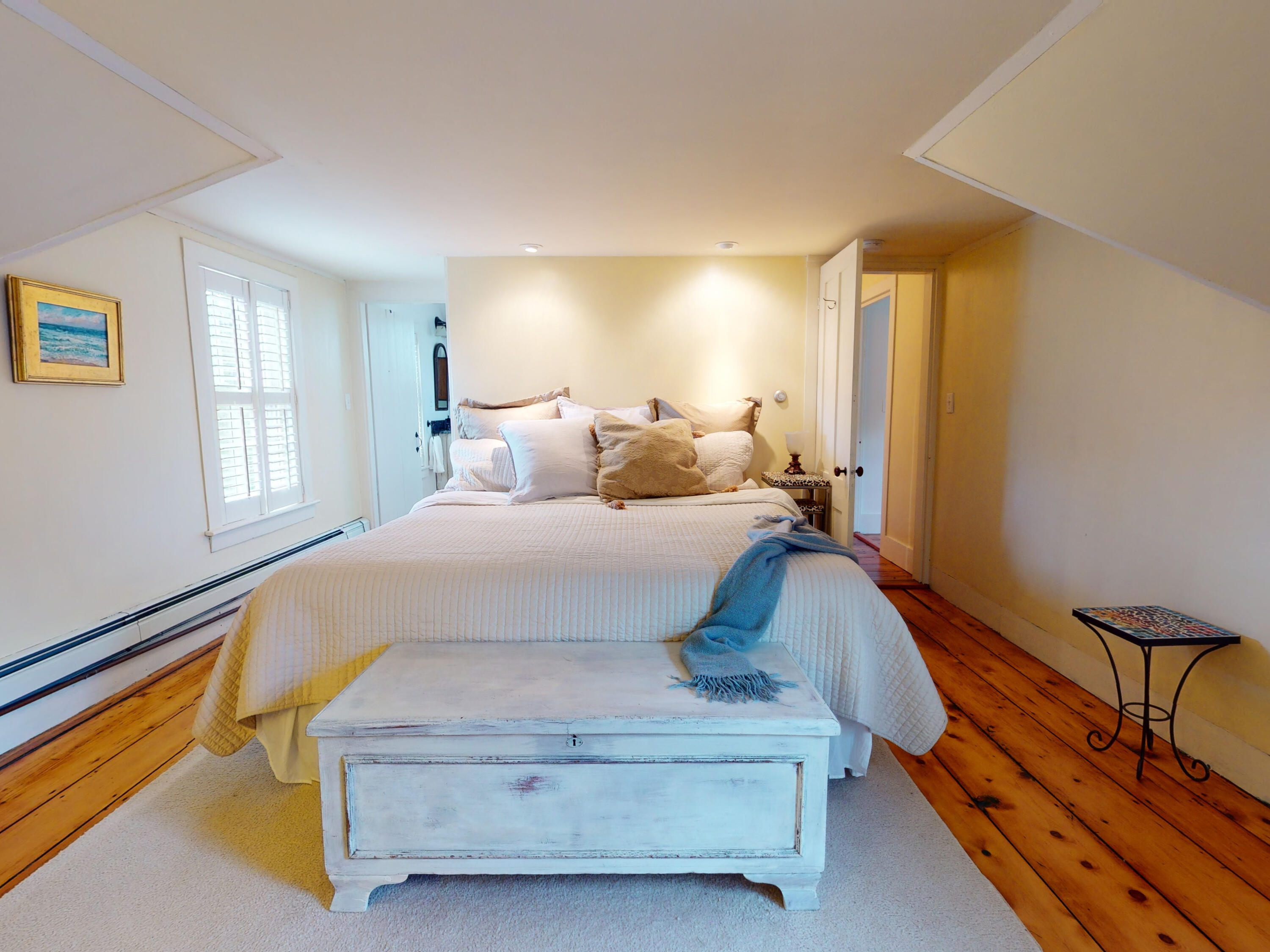 280 Chatham Road Harwich, MA 02645 - Photo 21 of 45 a bedroom with a bed and wooden floor