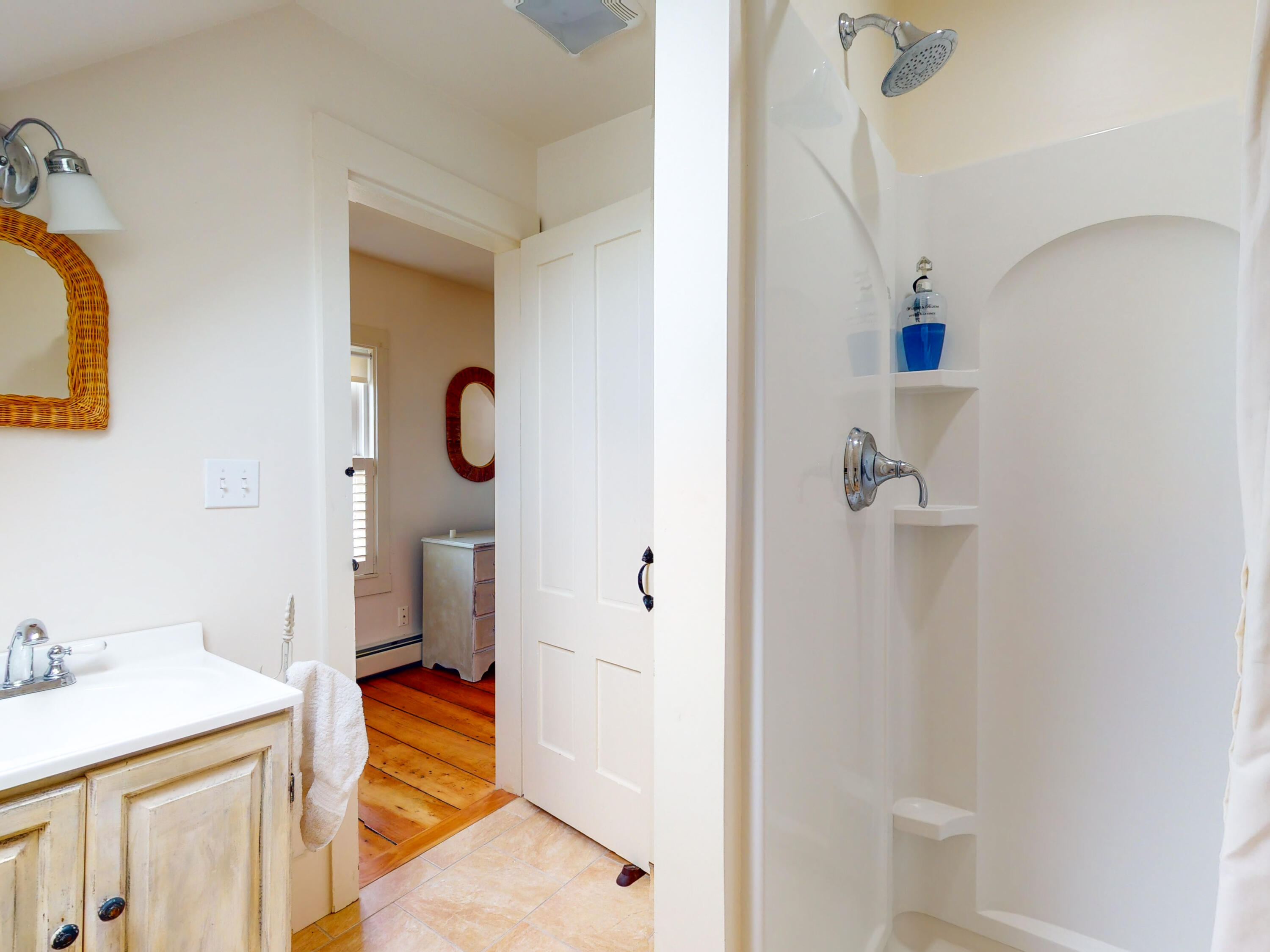 280 Chatham Road Harwich, MA 02645 - Photo 27 of 45 a bathroom with a sink and mirror with toilet