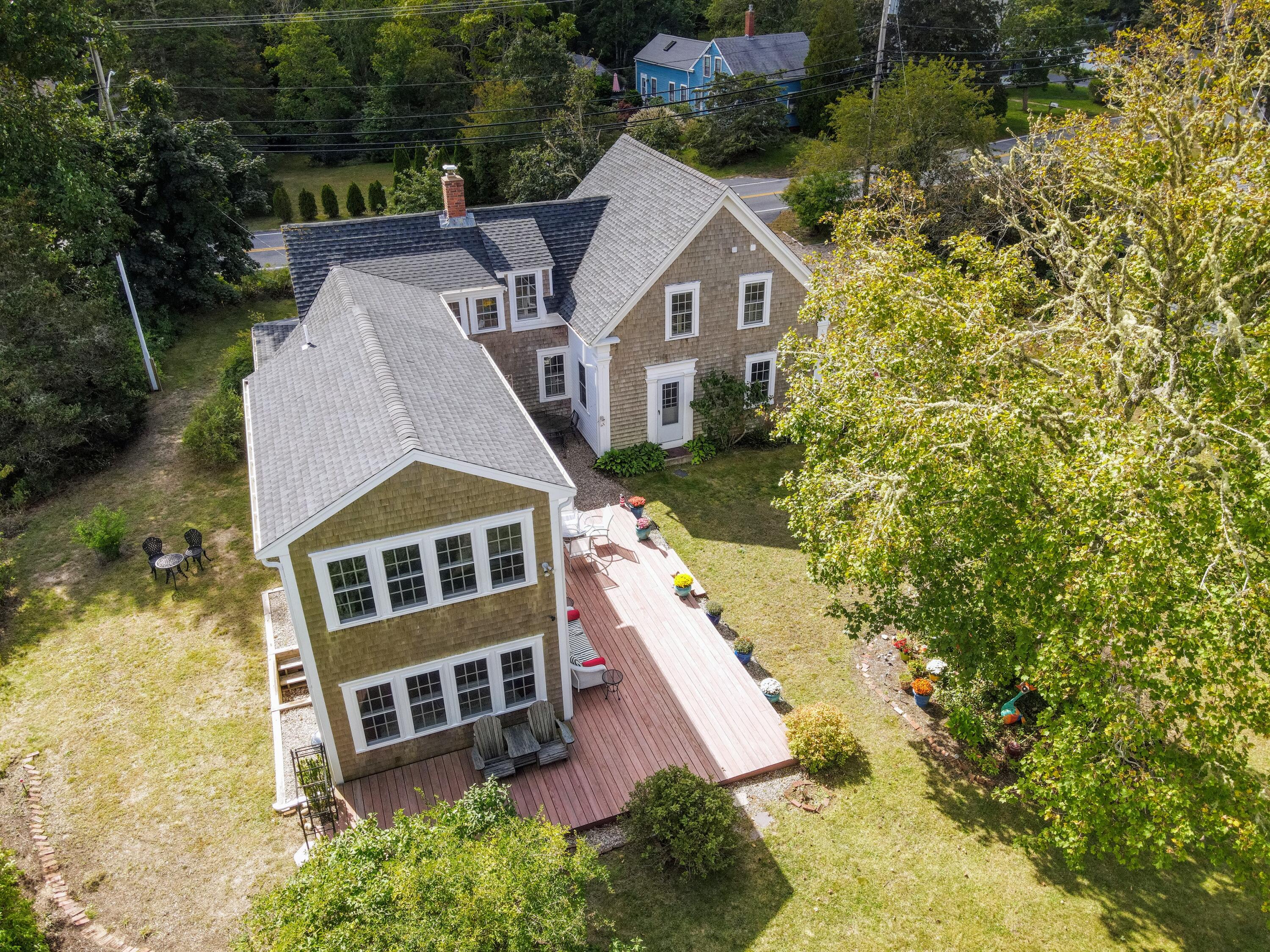 280 Chatham Road Harwich, MA 02645 - Photo 34 of 45 an aerial view of a house with a yard and potted plants