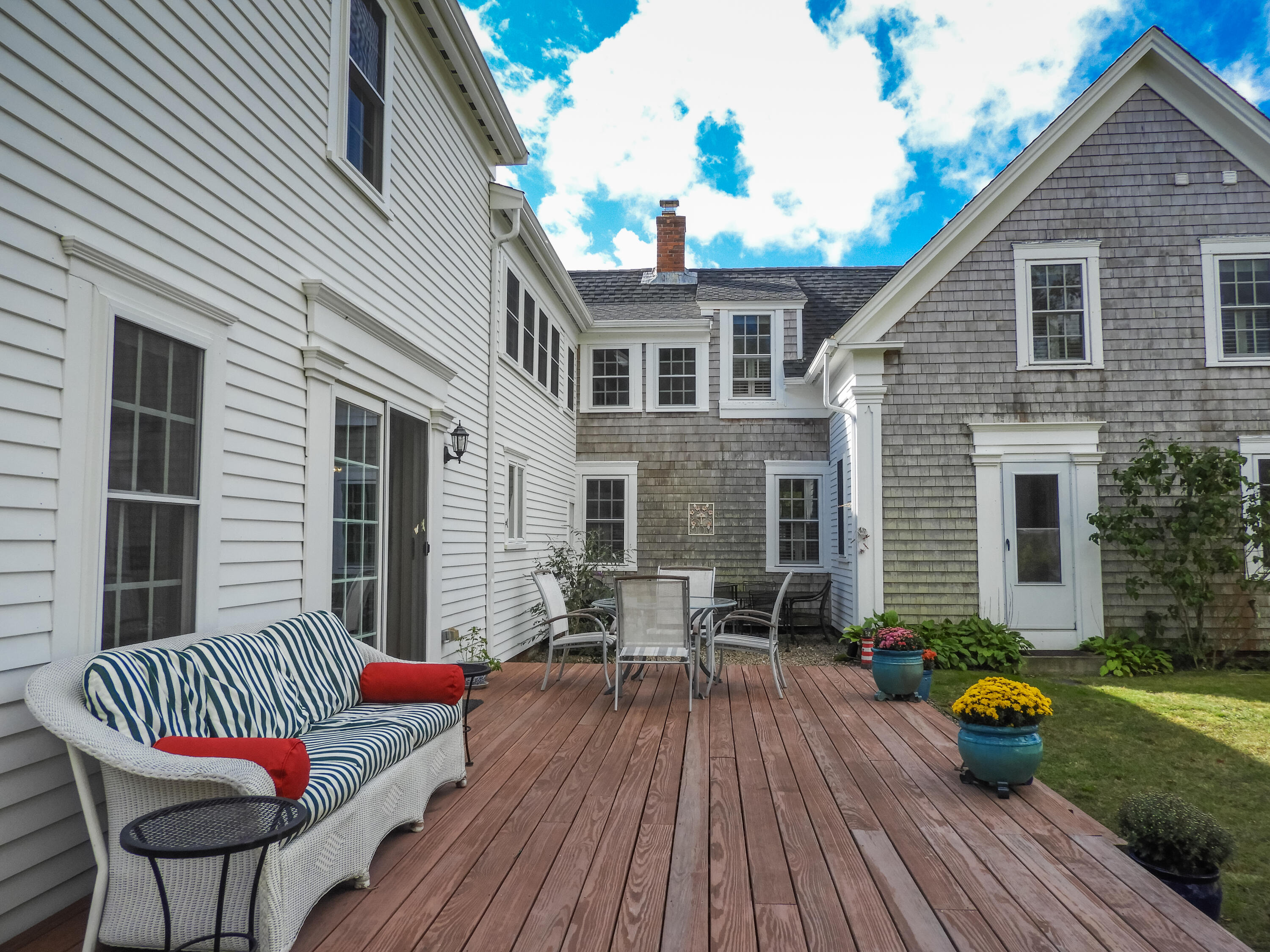280 Chatham Road Harwich, MA 02645 - Photo 37 of 45 a view of a house with a patio