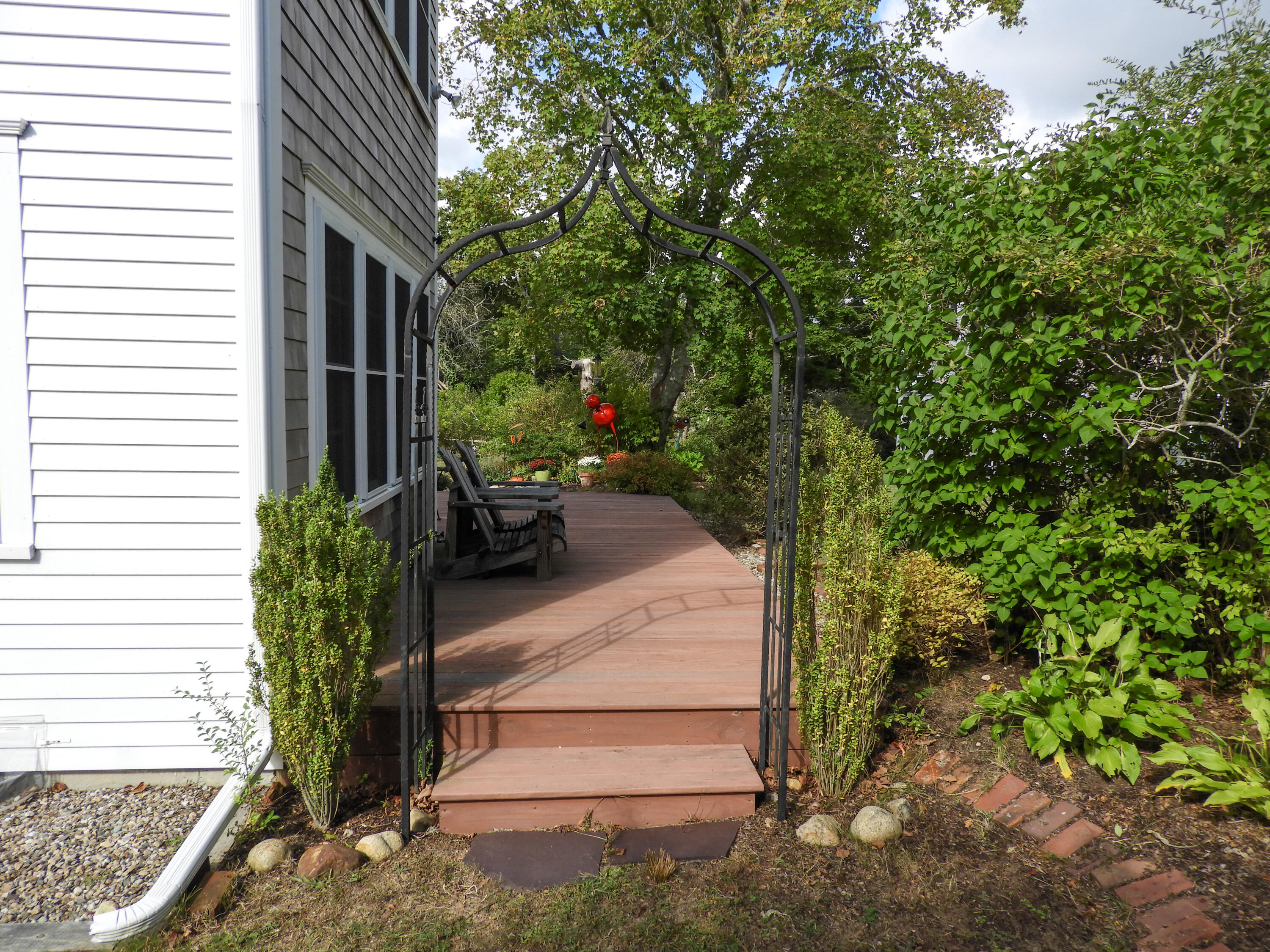 280 Chatham Road Harwich, MA 02645 - Photo 41 of 45 a backyard of a house with lots of green space