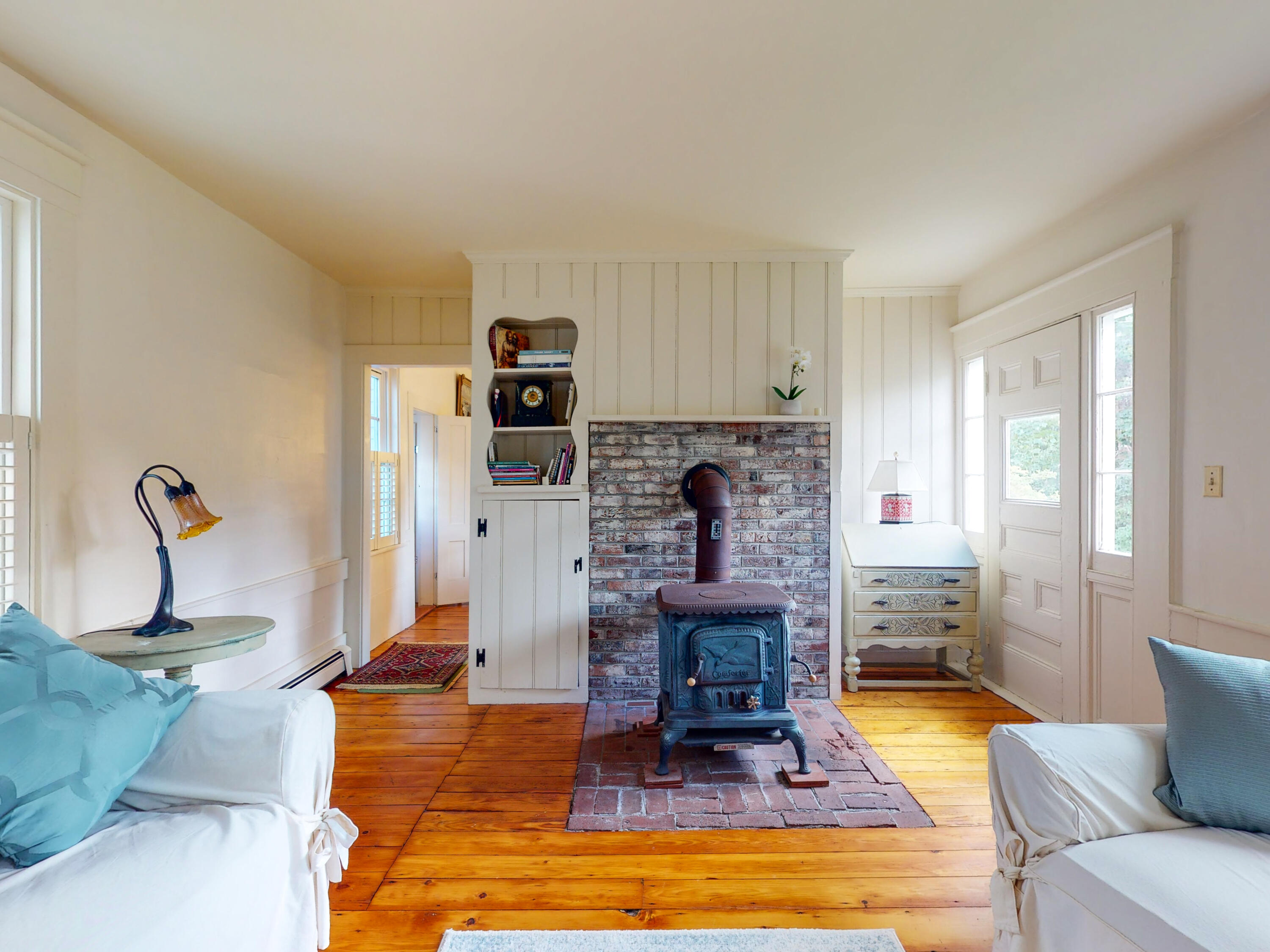 280 Chatham Road Harwich, MA 02645 - Photo 6 of 45 a living room with furniture and a fireplace