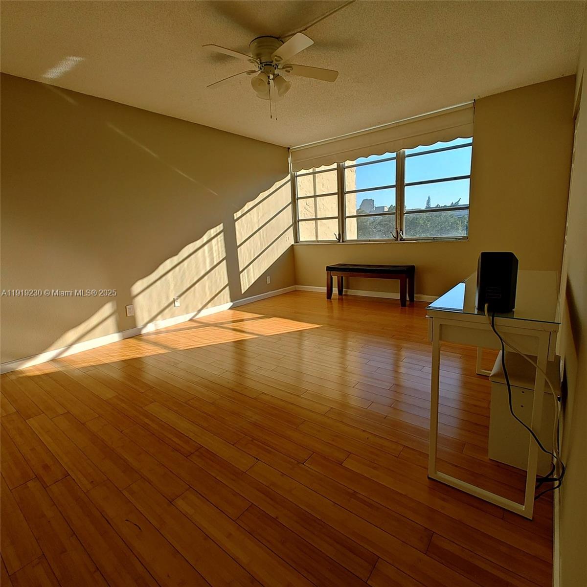 7051 Environ Boulevard, Unit 433 Lauderhill, FL 33319 - Photo 17 of 36 a view of a room with wooden floor and windows