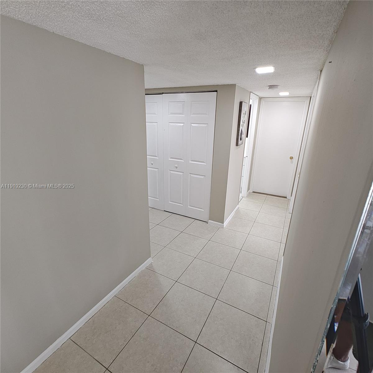 7051 Environ Boulevard, Unit 433 Lauderhill, FL 33319 - Photo 18 of 36 a view of a hallway