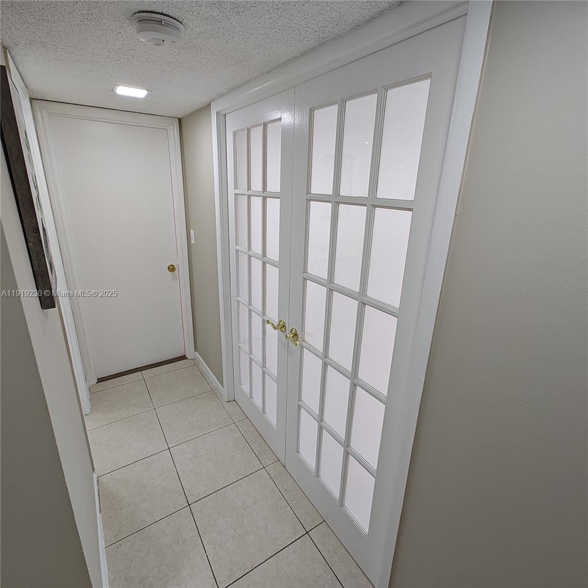 7051 Environ Boulevard, Unit 433 Lauderhill, FL 33319 - Photo 19 of 36 a view of entryway with stairs