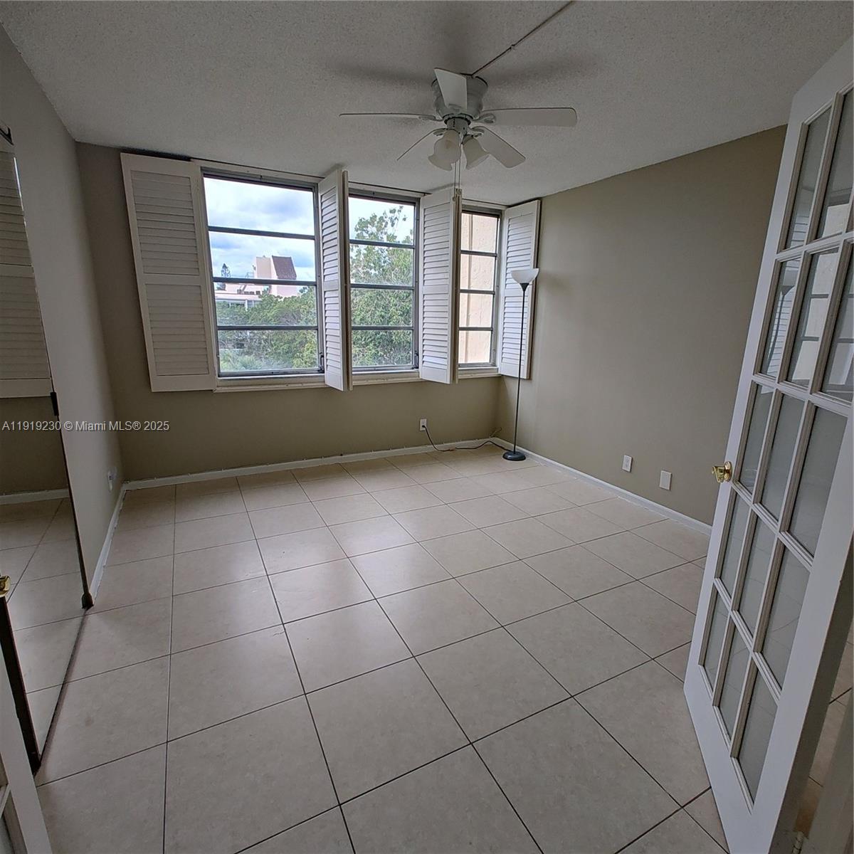 7051 Environ Boulevard, Unit 433 Lauderhill, FL 33319 - Photo 20 of 36 a view of an empty room with a window