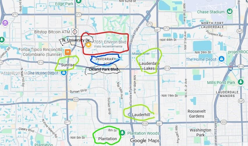 7051 Environ Boulevard, Unit 433 Lauderhill, FL 33319 - Photo 2 of 36 a street sign on a wall next to a building