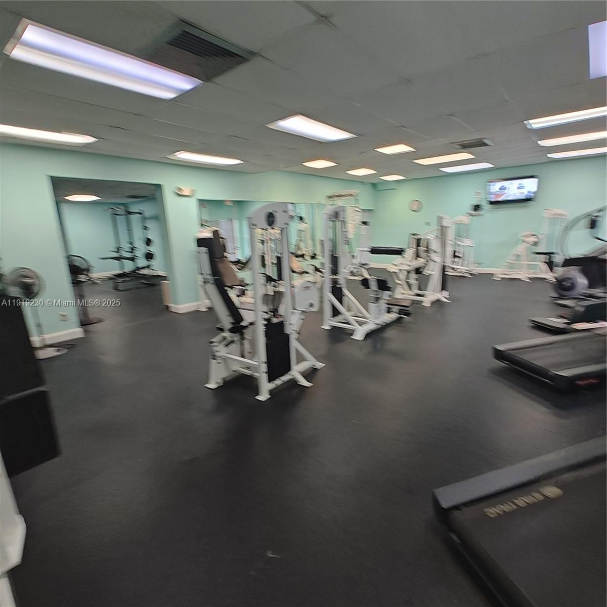 7051 Environ Boulevard, Unit 433 Lauderhill, FL 33319 - Photo 33 of 36 a view of a room with gym equipment