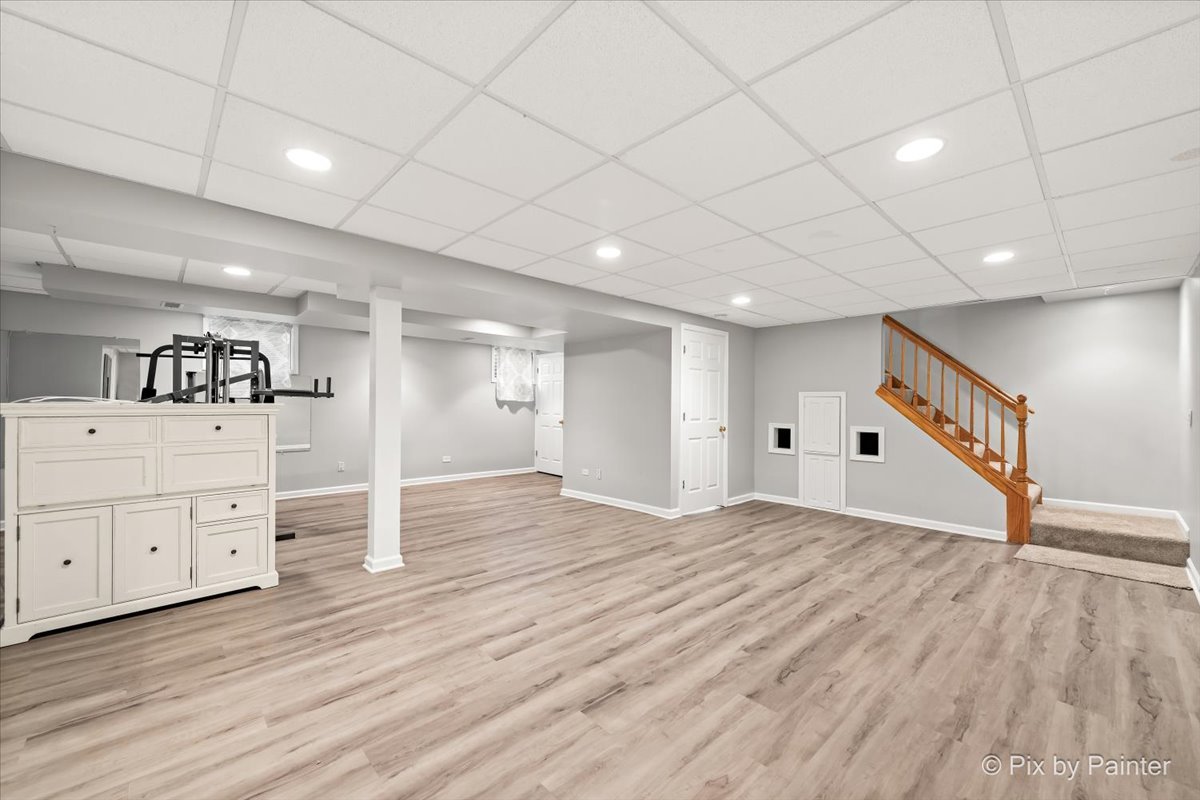 562 Boardman Circle Bolingbrook, IL 60440 - Photo 18 of 47 a view of a room with wooden floor