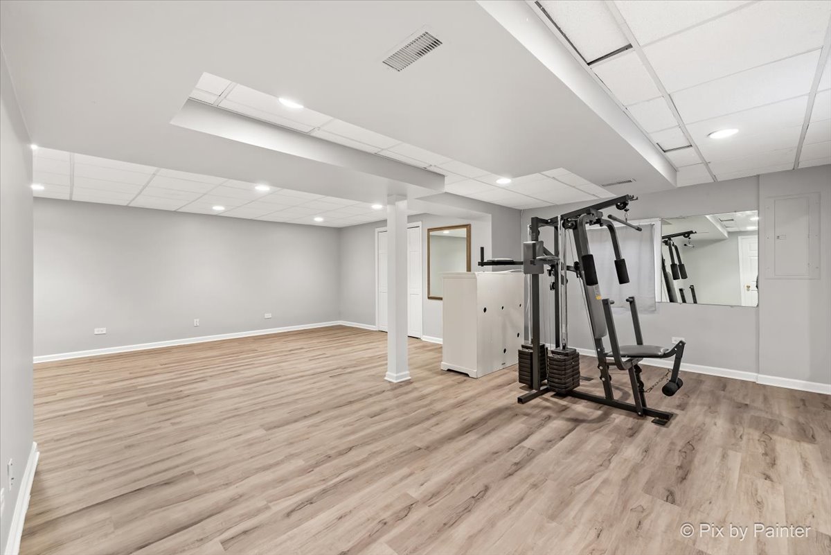 562 Boardman Circle Bolingbrook, IL 60440 - Photo 20 of 47 a view of a room with gym equipment