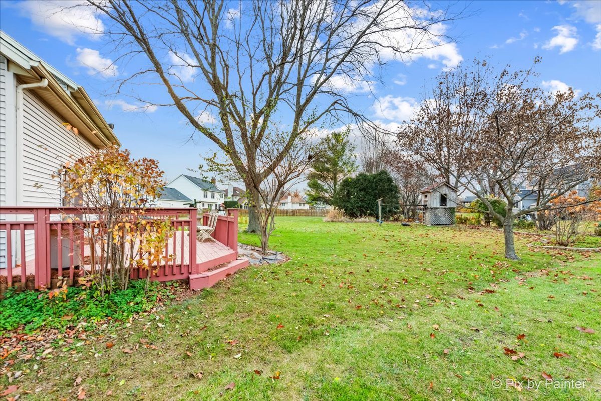 562 Boardman Circle Bolingbrook, IL 60440 - Photo 32 of 47 a view of a yard with a large tree