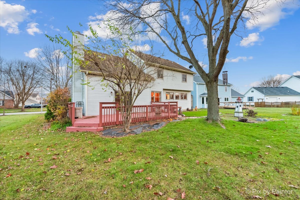 562 Boardman Circle Bolingbrook, IL 60440 - Photo 34 of 47 a view of a house with a yard