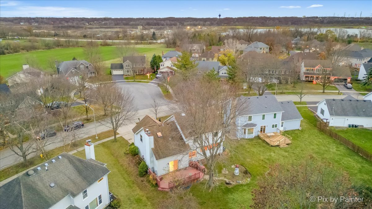 562 Boardman Circle Bolingbrook, IL 60440 - Photo 44 of 47 a view of a lake with a mountain