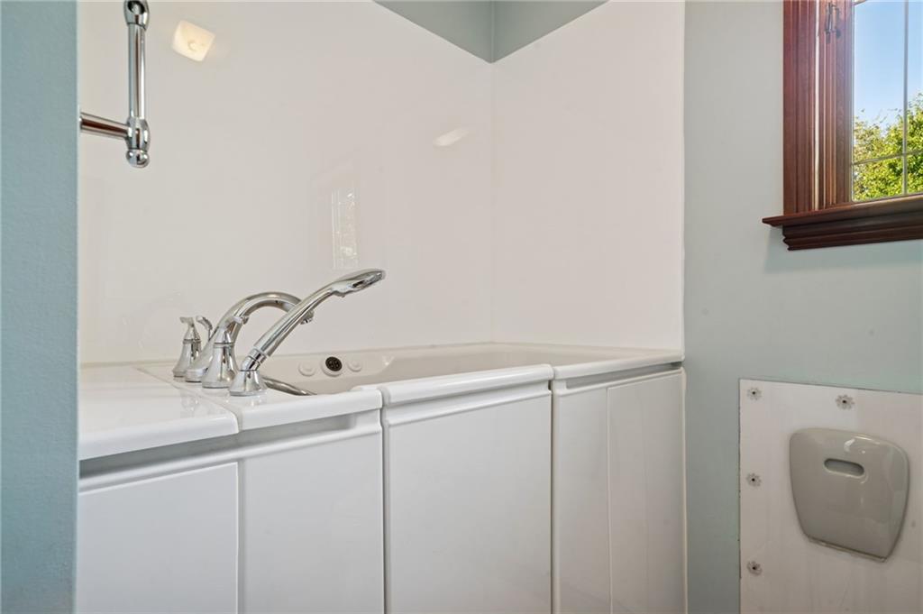 260 Jennie Drive Irwin, PA 15642 - Photo 33 of 49 a bathroom with a sink and mirror