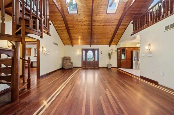 a view of a porch with wooden floor
