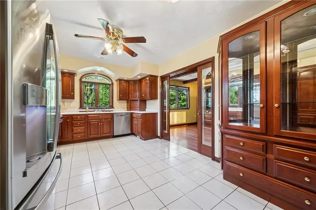 a view of a kitchen cabinets and a stove
