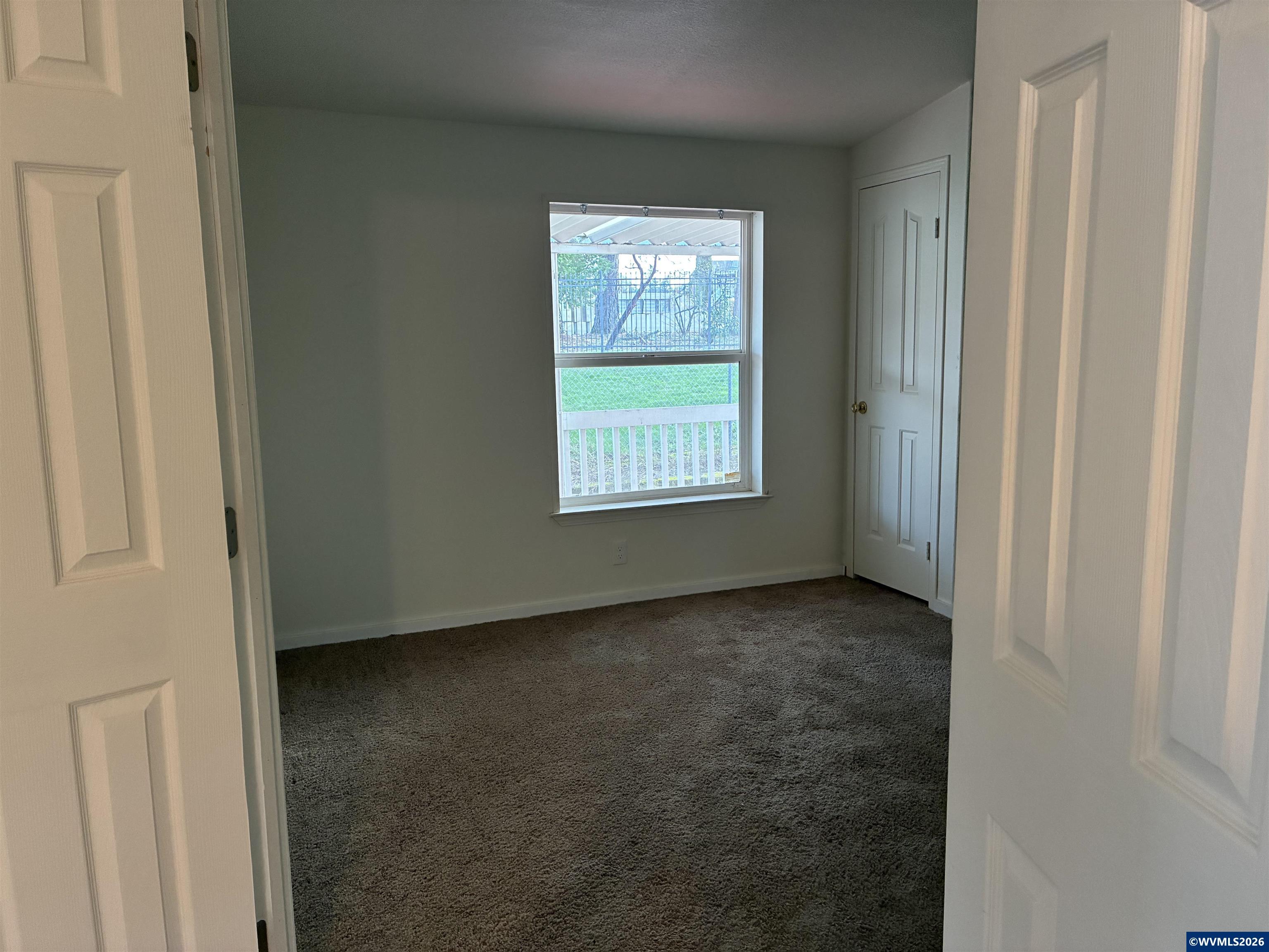 2000 Robins Lane Southeast, Unit 7 Salem, OR 97306 - Photo 13 of 39 a view of a window in an empty room