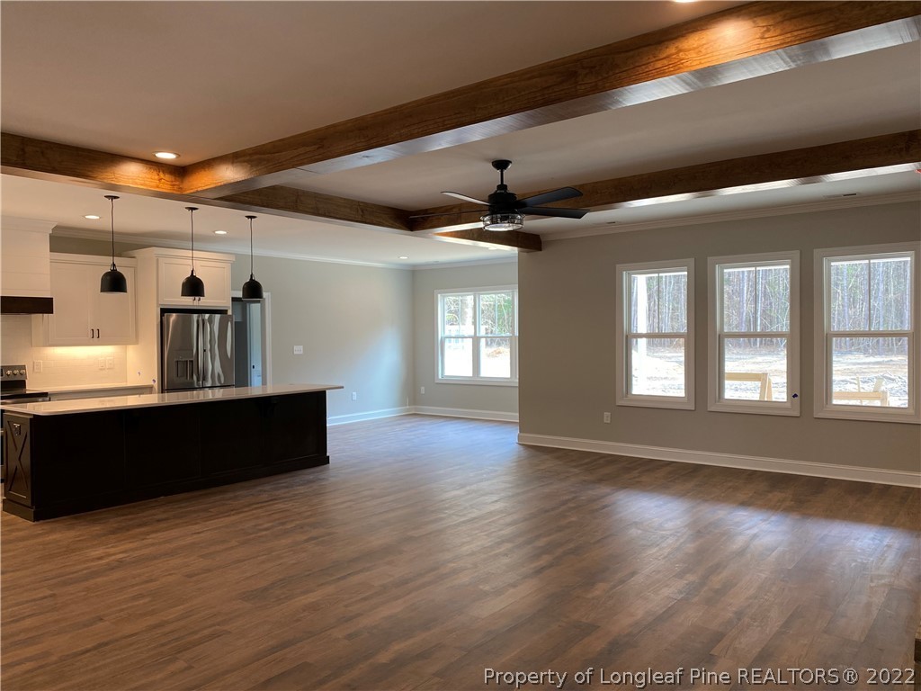 3900 Gainey Road Fayetteville, NC 28306 - Photo 3 of 9 a view of a room with wooden floor