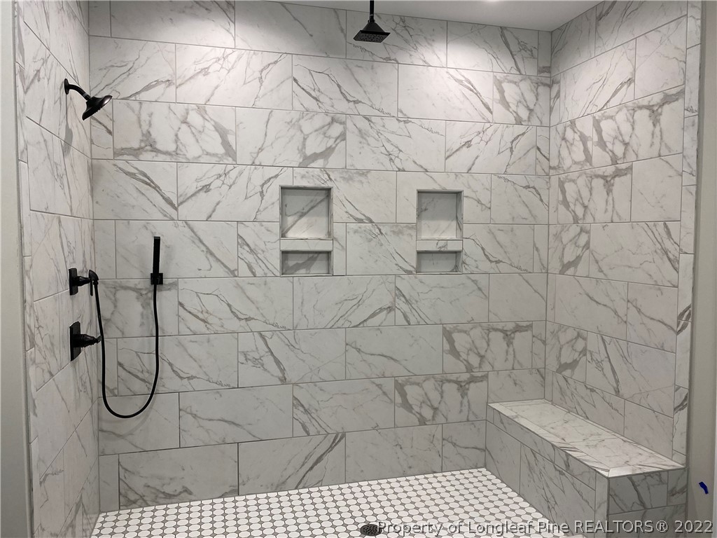 3900 Gainey Road Fayetteville, NC 28306 - Photo 8 of 9 a bathroom with a shower