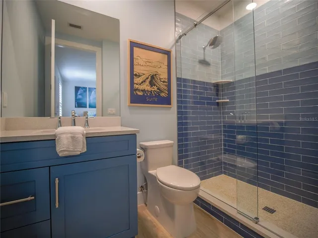 a view of backyard with table and chairs