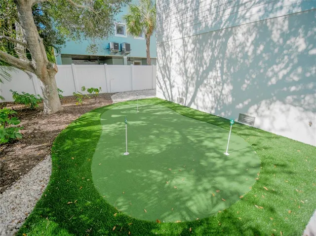 a view of a back yard of the house