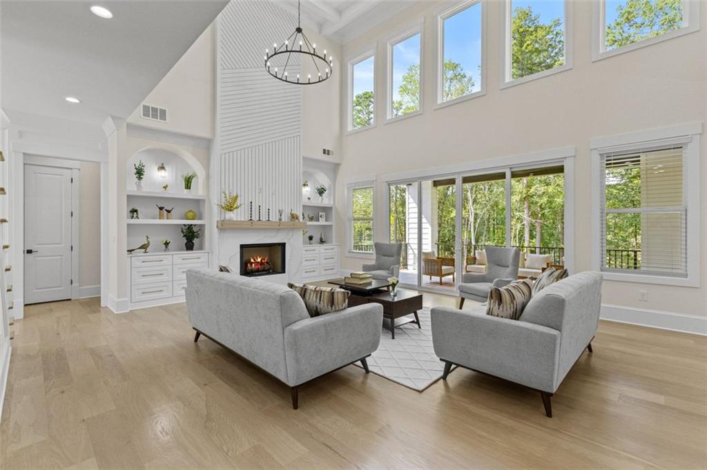 5 Olevia Street Winder, GA 30680 - Photo 20 of 106 a living room with furniture fireplace and a large window
