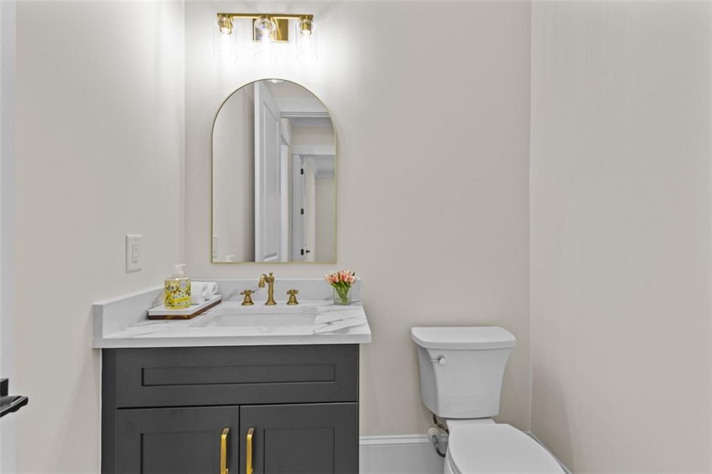 5 Olevia Street Winder, GA 30680 - Photo 38 of 106 a bathroom with a sink and a toilet