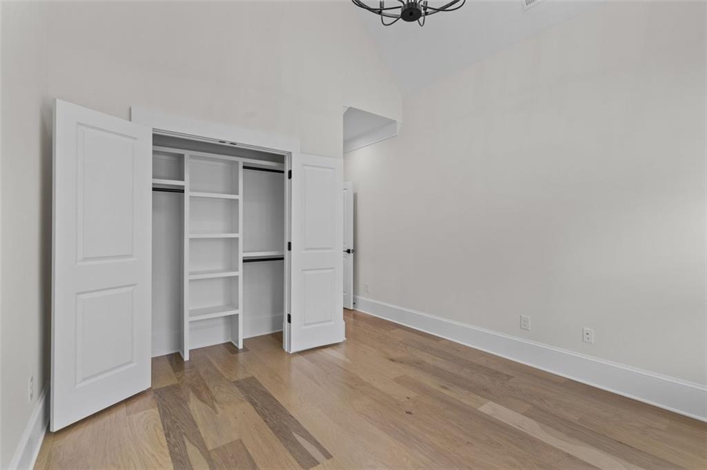 5 Olevia Street Winder, GA 30680 - Photo 58 of 106 a view of walk in closet with empty racks