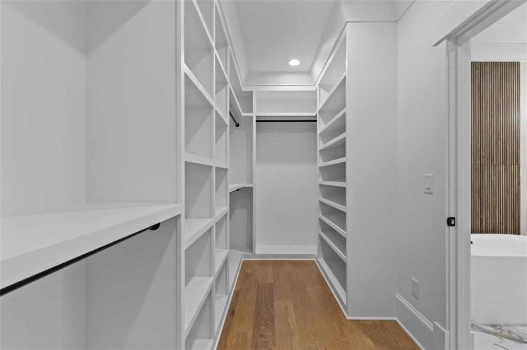 5 Olevia Street Winder, GA 30680 - Photo 72 of 106 a view of walk in closet with empty racks