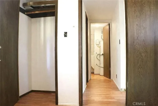 a view of a bathroom from a hallway